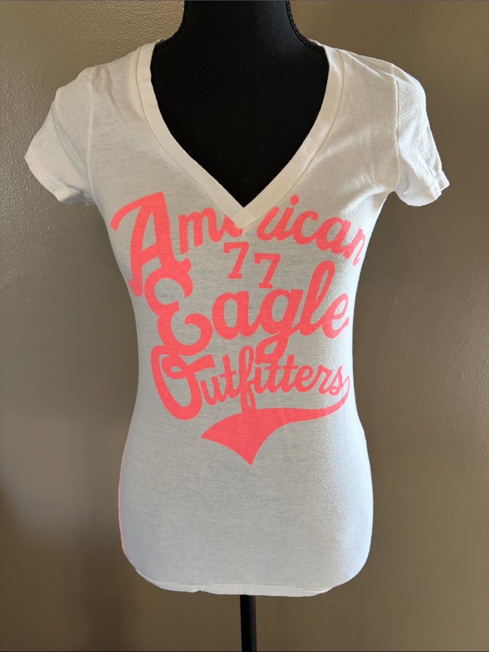 American Eagle Outfitters White V-Neck Tee with Coral Logo